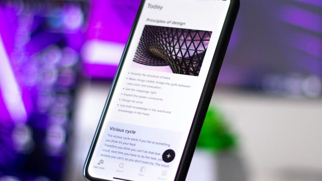 Smartphone on a table showing a mobile landing page for a local service business